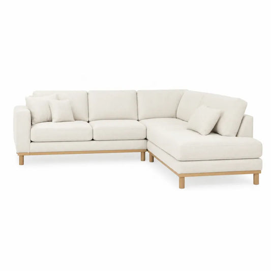 Narożna sofa z tkaniny i drewnianą ramą